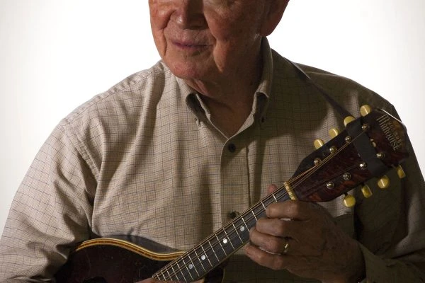 Musician portrait of Guy Zimmerman with a mandolin