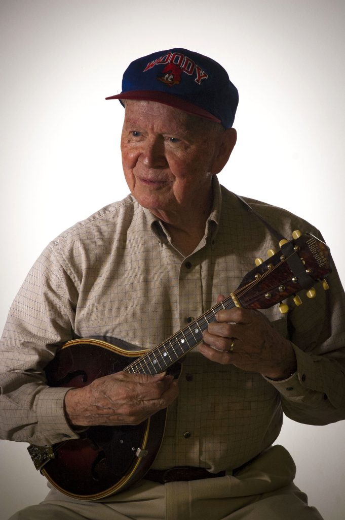 Musician portrait of Guy Zimmerman with a mandolin
