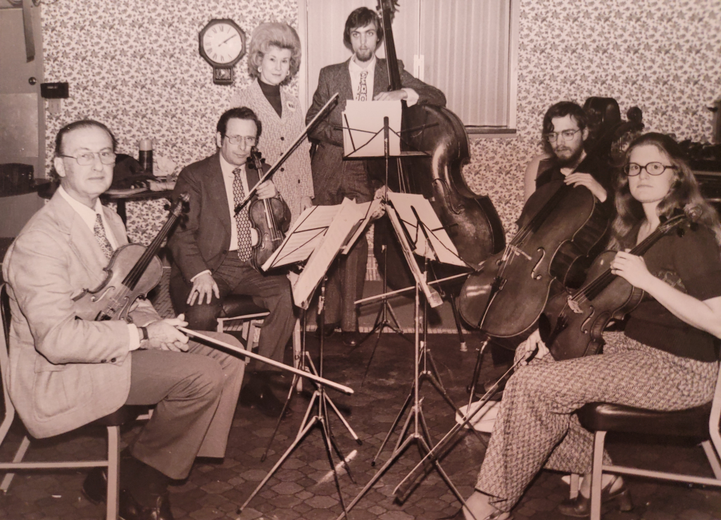 Adrian Mann and Lilian Embick (top center) with the Fort Wayne Philharmonic string quartet in 1974.