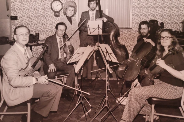 Adrian Mann and Lilian Embick (top center) with the Fort Wayne Philharmonic string quartet in 1974.